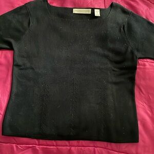Valerie Stevens pure silk hundred percent silk size medium and it’s a ribbed top